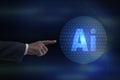 Businessman index finger about to touching AI Artificial intelligence icon on a virtual screen. Representing machine learning and Royalty Free Stock Photo