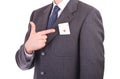 Businessman indicating ace card in his pocket. Royalty Free Stock Photo