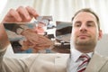 Businessman inserting last puzzle piece