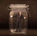 Businessman inside a jar with powerful hand drawn lines concept