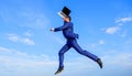 Businessman inspired entrepreneur feels powerful going to change world. Man inspired holds laptop above while jump