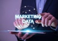 Businessman interacting with digital marketing data on a tablet computer interface Royalty Free Stock Photo