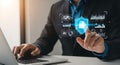 Businessman interacting with digital security interface on laptop image photo Royalty Free Stock Photo