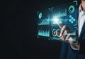 Businessman interacting with futuristic data visualization interface Royalty Free Stock Photo