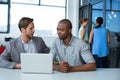 Businessman interacting with his colleague Royalty Free Stock Photo