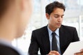 Businessman interviewing female employee