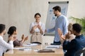 Businessman introduce excited female newcomer to team