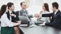 Businessman and investor shake hands at the negotiating table Royalty Free Stock Photo