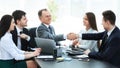 Businessman and investor shake hands at the negotiating table Royalty Free Stock Photo