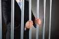 Businessman in jail Royalty Free Stock Photo