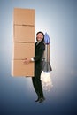 The businessman with jetpack delivering boxes globally