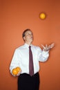 Businessman juggling Royalty Free Stock Photo