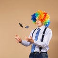 Businessman juggling mobile phones Royalty Free Stock Photo