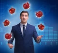 Businessman juggling with piggybanks in business concept Royalty Free Stock Photo