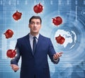 Businessman juggling with piggybanks in business concept Royalty Free Stock Photo