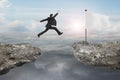 Businessman jump on cliff with blank flag and sunlight cloudscapes
