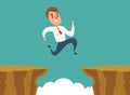 Businessman jump over cliff gap, overcome the difficulty. Business concept Royalty Free Stock Photo