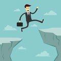 Businessman Jumping across the chasm Royalty Free Stock Photo