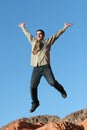 Businessman jumping in the air Royalty Free Stock Photo