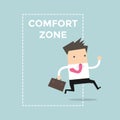 Businessman jumping out of the comfort zone to success. Royalty Free Stock Photo