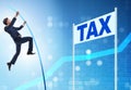 Businessman jumping over tax in tax evasion avoidance concept Royalty Free Stock Photo