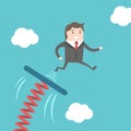 Businessman jumping from springboard