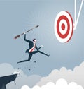 Businessman jumps throwing arrow to target, Business success concept