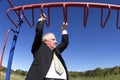 Businessman on Jungle Gym