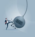 Businessman kicks a giant wrecking ball with a word DEBT