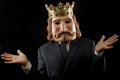 Businessman with king mask surprised Royalty Free Stock Photo