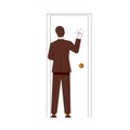 The businessman knocks on the office door. Royalty Free Stock Photo