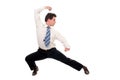 Businessman in kung fu pose