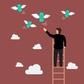 Businessman on the ladder catching a money fly Royalty Free Stock Photo