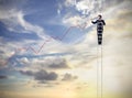 Businessman on a ladder