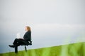 Businessman with laptop outdoors Royalty Free Stock Photo