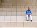 Businessman laptop and steps Royalty Free Stock Photo