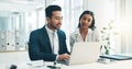 Businessman, laptop and team in finance discussion, project planning or schedule at office. Asian man and business woman Royalty Free Stock Photo