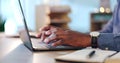 Businessman, laptop and typing at office for communication, project or online research on table. Closeup of male person Royalty Free Stock Photo