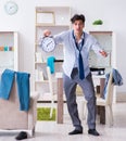 The businessman late for office due to oversleeping after overni Royalty Free Stock Photo