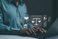 Businessman or Lawyer working with legal services icons on a laptop virtual screen can legal advice online such as labor law for Royalty Free Stock Photo