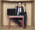 Businessman leading two calls at the same time, box office