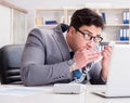 Businessman leaking confidential information over phone Royalty Free Stock Photo