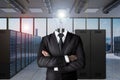 Businessman with light bulb as head inside large server room having an idea; conceptual founder 3D Illustration