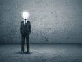 Businessman with lightbulb instead of a head Royalty Free Stock Photo