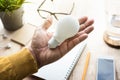 Businessman with lightbulb in workplace.Ideas, creativity Royalty Free Stock Photo