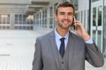 Businessman listening on the phone with enthusiasm Royalty Free Stock Photo