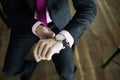 Businessman look his watch Royalty Free Stock Photo