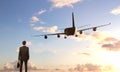 Businessman looking on airplane Royalty Free Stock Photo