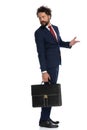 Businessman looking back and gesturing what`s the matter Royalty Free Stock Photo