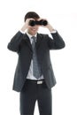 Businessman looking through a binoculars Royalty Free Stock Photo